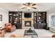 Finished basement with stone fireplace and built-in shelving at 3173 Woodrow Ne Way, Brookhaven, GA 30319