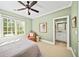 Bright bedroom with ensuite bathroom and window at 3173 Woodrow Ne Way, Brookhaven, GA 30319