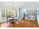 Charming dining room with hardwood floors and large windows at 3173 Woodrow Ne Way, Brookhaven, GA 30319