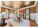 Formal dining room with hardwood floors and chandelier at 3173 Woodrow Ne Way, Brookhaven, GA 30319