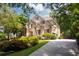 Brick two-story home with landscaped yard and driveway at 3173 Woodrow Ne Way, Brookhaven, GA 30319