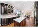 Elegant kitchen with quartz countertops, custom cabinetry, and a large island at 3173 Woodrow Ne Way, Brookhaven, GA 30319