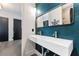 Contemporary bathroom with double vanity and herringbone-patterned wall at 1544 Bullard Rd, Powder Springs, GA 30127