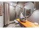 Spa-like bathroom with a stone sink, a walk-in shower, and a large mirror at 1544 Bullard Rd, Powder Springs, GA 30127
