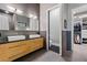 Bathroom with double vanity, toilet, and walk-in closet at 1544 Bullard Rd, Powder Springs, GA 30127