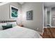 Simple bedroom with a queen bed and hardwood floors at 1544 Bullard Rd, Powder Springs, GA 30127