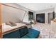 bedroom with a teepee bed and teal couch at 1544 Bullard Rd, Powder Springs, GA 30127