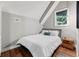 Cozy bedroom with a queen bed and hardwood floors at 1544 Bullard Rd, Powder Springs, GA 30127