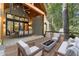 Spacious deck with a fire pit and comfortable seating at 1544 Bullard Rd, Powder Springs, GA 30127