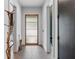 Bright and airy entryway with a frosted glass door and tile flooring at 1544 Bullard Rd, Powder Springs, GA 30127