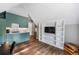 Modern kitchen with green cabinets, white subway tile, and hardwood floors at 1544 Bullard Rd, Powder Springs, GA 30127