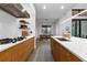 Spacious kitchen featuring wood cabinetry and quartz countertops at 1544 Bullard Rd, Powder Springs, GA 30127