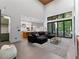 Open concept living area with kitchen and access to outdoor space at 1544 Bullard Rd, Powder Springs, GA 30127