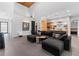 Open living room with sectional sofa and kitchen views at 1544 Bullard Rd, Powder Springs, GA 30127