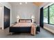Spacious main bedroom with a comfy bed and large windows at 1544 Bullard Rd, Powder Springs, GA 30127