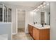 Main bathroom with double vanity and walk-in shower at 1077 Balvaird Dr, Lawrenceville, GA 30045