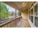 Wooden deck overlooking wooded backyard at 1077 Balvaird Dr, Lawrenceville, GA 30045