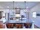 Modern kitchen with granite countertops and white cabinets at 1430 New Hope Church Rd, Loganville, GA 30052