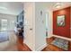 Bright entryway with hardwood floors and accent wall at 230 E Ponce De Leon Ave # 219, Decatur, GA 30030