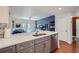 Kitchen island with seating and stainless steel appliances at 230 E Ponce De Leon Ave # 219, Decatur, GA 30030