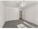 Well-lit bedroom with double doors and carpet at 2490 Insdale Nw Trce, Acworth, GA 30101