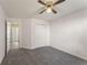 Bedroom with double doors and carpet flooring at 2490 Insdale Nw Trce, Acworth, GA 30101