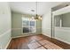 Dining room with hardwood floors and a chandelier at 2490 Insdale Nw Trce, Acworth, GA 30101