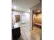 Bathroom with walk-in shower and granite vanity at 500 Gristmill Ln, Hampton, GA 30228