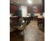 Kitchen with dark wood cabinets and tile floor at 500 Gristmill Ln, Hampton, GA 30228