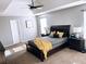 Spacious main bedroom with a ceiling fan and large bed at 500 Gristmill Ln, Hampton, GA 30228