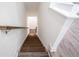 Wooden staircase leading down to the basement at 5215 Riden Ct, Buford, GA 30518