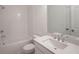 Bright bathroom featuring white subway tiles and a modern vanity at 5215 Riden Ct, Buford, GA 30518