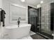 Modern bathroom with soaking tub and walk-in shower at 1302 Ladd St, Atlanta, GA 30310