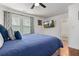 Relaxing bedroom with a queen bed, TV, and access to a bathroom at 1302 Ladd St, Atlanta, GA 30310