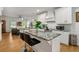 Spacious kitchen with granite countertops, stainless steel appliances, and white shaker cabinets at 1302 Ladd St, Atlanta, GA 30310