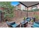 Cozy backyard patio area with comfortable seating, perfect for outdoor relaxation and entertaining at 6851 Roswell Rd # J1, Atlanta, GA 30328