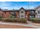 Beautiful two-story brick condo building featuring private balconies and landscaped grounds at 6851 Roswell Rd # J1, Atlanta, GA 30328