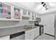 Bright kitchen features ample counter space, lots of storage and stainless steel appliances at 6851 Roswell Rd # J1, Atlanta, GA 30328