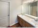 Bathroom with double sinks and a shower at 85 Kristen Pl, Covington, GA 30016