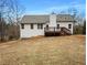 White house exterior with deck and large backyard at 85 Kristen Pl, Covington, GA 30016