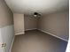 Simple bedroom with ceiling fan and tile floors at 5174 Stone Trce, Stone Mountain, GA 30083