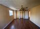 Bright bedroom featuring wood floors and ample closet space at 5174 Stone Trce, Stone Mountain, GA 30083