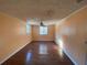 Spacious bedroom with wood flooring and ceiling fan at 5174 Stone Trce, Stone Mountain, GA 30083