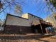 Back of house with deck, and wooded area at 5174 Stone Trce, Stone Mountain, GA 30083