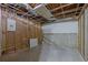 Unfinished basement space with exposed beams and concrete flooring at 148 Shady View Pl, Lawrenceville, GA 30044