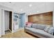 Basement with a kitchenette, living area, and wood-paneled walls at 148 Shady View Pl, Lawrenceville, GA 30044
