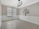Bright, open dining room features decorative wall trim, a modern light fixture and a large window for natural light at 148 Shady View Pl, Lawrenceville, GA 30044