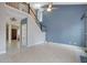 The living room features a fireplace, ceiling fan and staircase to the second floor at 148 Shady View Pl, Lawrenceville, GA 30044