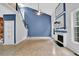 Bright living room with vaulted ceilings, tile floors, fireplace, and backyard views at 148 Shady View Pl, Lawrenceville, GA 30044