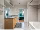 Clean bathroom featuring granite countertops, vanity cabinet, and tile flooring at 250 Pharr Ne Rd # 607, Atlanta, GA 30305